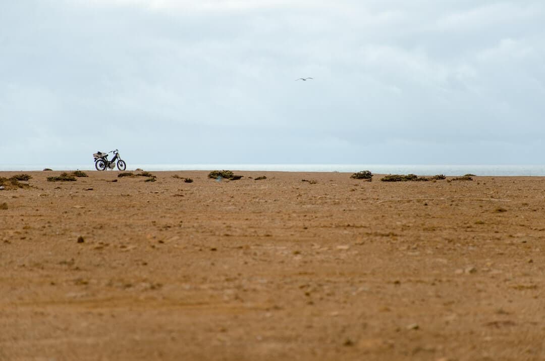 motorcycle in the middle of desert